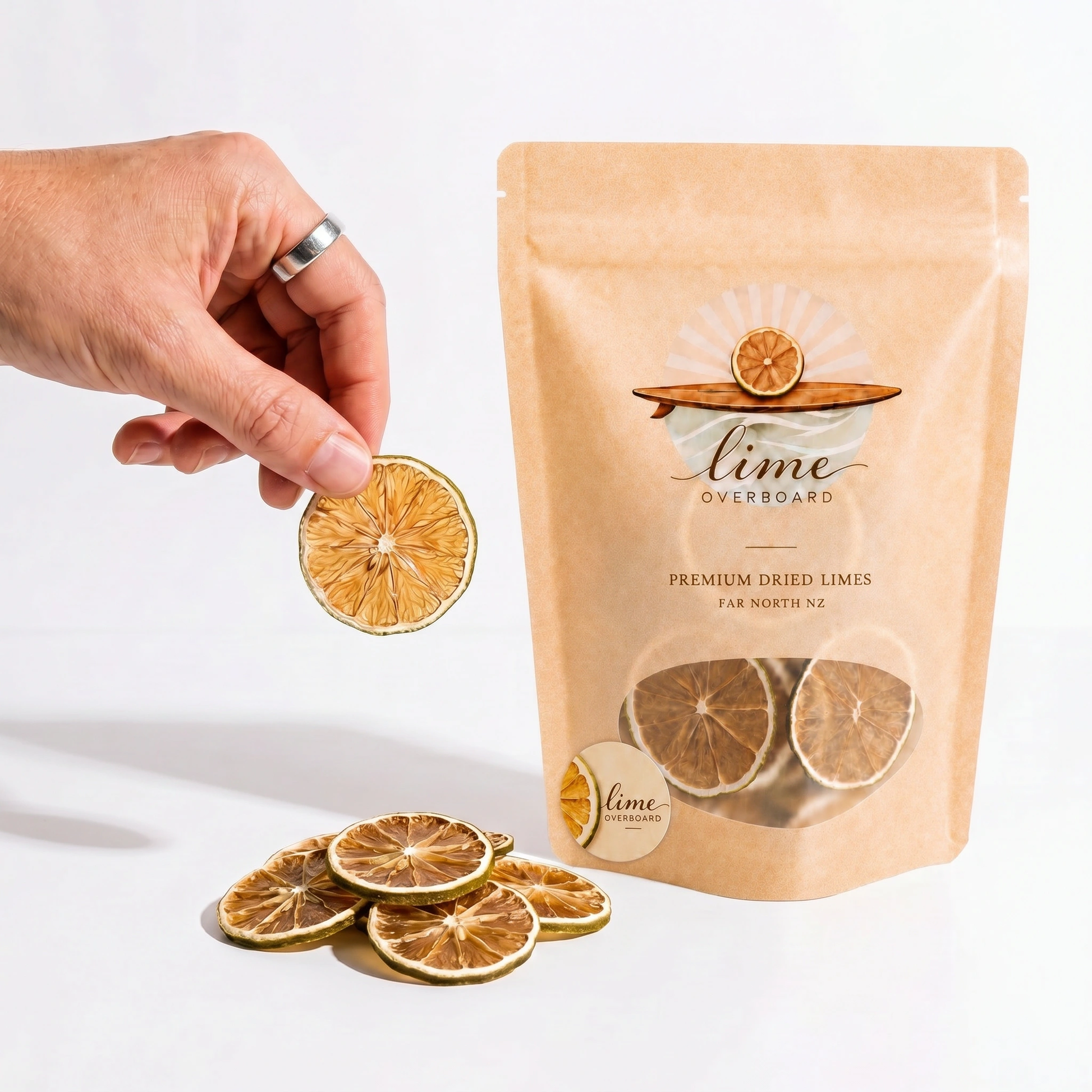 Dried lime garnish pouch with a hand picking up a lime slice